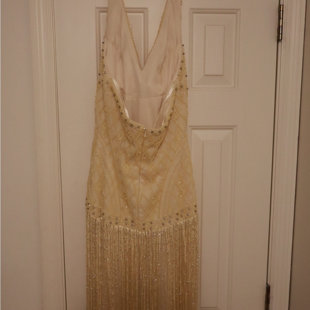 Elegant Cream Backless Halter Gown - Picture 8 of 9